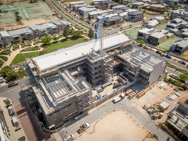 Drone shot of Form Apartments by Match in North Coogee showing the roof being installed as well as its proximity to the park