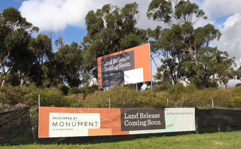 Coming soon billboard and wrap fence signage for Land by Monument in Beeliar